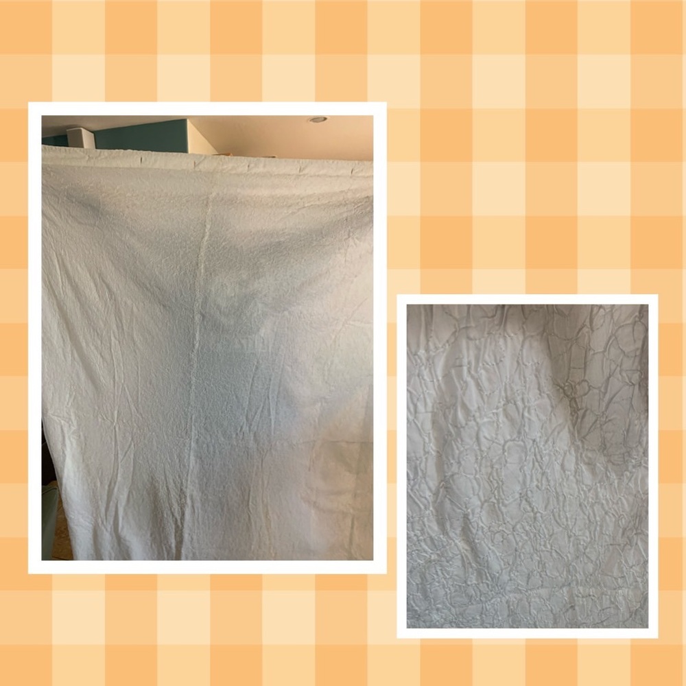 White shower curtain from Crate & Barrel
